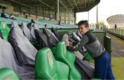 28 July 2018; Jack McNally, age 11, from St Patrick's Road, Limerick, assists with removal of seat covers prior to the Electric Ireland GAA Football All-Ireland Minor Championship Quarter-Final match between Kerry and Roscommon at the Gaelic Grounds in Limerick. Photo by Diarmuid Greene/Sportsfile