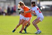 28 July 2018; Maebh Morriarty of Armagh in action against Eimear Scally of Cork during the TG4 All-Ireland Ladies Football Senior Championship qualifier Group 2 Round 3 match between Armagh and Cork at Duggan Park in Ballinasloe, Galway. Photo by Harry Murphy/Sportsfile