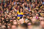 28 July 2018; A Clare supporter celebrates a late point during the GAA Hurling All-Ireland Senior Championship semi-final match between Galway and Clare at Croke Park in Dublin. Photo by David Fitzgerald/Sportsfile
