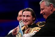 28 July 2018; Katie Taylor celebrates with both championship belts following her WBA & IBF World Lightweight Championship bout with Kimberly Connor at The O2 Arena in London, England. Photo by Stephen McCarthy/Sportsfile