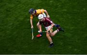 28 July 2018; Niamh Franks of Clonlisk National School, Offaly, representing Galway, in action against Paige Bell of Derrychin Primary School, Tyrone, representing Clare, during the INTO Cumann na mBunscol GAA Respect Exhibition Go Games at the GAA Hurling All-Ireland Senior Championship semi-final match between Galway and Clare at Croke Park in Dublin. Photo by Ramsey Cardy/Sportsfile