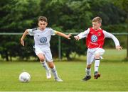 29 July 2018; Rhys Bartley of Crumlin United, centre, in action against Sam Dunne of Tolka Rovers, during Ireland's premier underaged soccer tournament, the Volkswagen Junior Masters. The competition sees U13 teams from around Ireland compete for the title and a €2,500 prize for their club, over the days of July 28th and 29th, at AUL Complex in Dublin. Photo by Seb Daly/Sportsfile