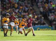 28 July 2018; Tomás Guiney, Rathnure National School, Wexford, representing Galway, in action against Shane Henry, Scoil Phádraig, Clane, Cill Dara, representing Clare, during the INTO Cumann na mBunscol GAA Respect Exhibition Go Games at the GAA Hurling All-Ireland Senior Championship semi-final match between Galway and Clare at Croke Park in Dublin. Photo by Ray McManus/Sportsfile