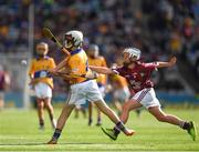28 July 2018; John Dougan, St Michael's PS, Belfast, representing Clare, in action against David Hurley, Claremorris Boys National School, Mayo, representing Galway, during the INTO Cumann na mBunscol GAA Respect Exhibition Go Games at the GAA Hurling All-Ireland Senior Championship semi-final match between Galway and Clare at Croke Park in Dublin. Photo by Ray McManus/Sportsfile