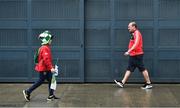 29 July 2018; A Limerick and a Cork supporter arrive prior to the GAA Hurling All-Ireland Senior Championship semi-final match between Cork and Limerick at Croke Park in Dublin. Photo by Brendan Moran/Sportsfile