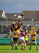 29 July 2018; Cathal Sweeney and James McLoughlin of Galway in action against Chibby Okoye of Clare during the Electric Ireland GAA Football All-Ireland Minor Championship Quarter-Final between Galway and Clare at Bord Na Mona O'Connor Park in Tullamore, Co Offaly. Photo by Harry Murphy/Sportsfile