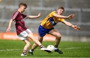 29 July 2018; Matthew Cooley of Galway shoots to score a point under pressure from Jack Reidy of Clare during the Electric Ireland GAA Football All-Ireland Minor Championship Quarter-Final between Galway and Clare at Bord Na Mona O'Connor Park in Tullamore, Co Offaly. Photo by Harry Murphy/Sportsfile