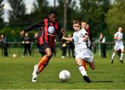 29 July 2018; Mark Tarzan of St Kevin's in action against Luke Nolan of Crumlin United, during Ireland's premier underaged soccer tournament, the Volkswagen Junior Masters. The competition sees U13 teams from around Ireland compete for the title and a €2,500 prize for their club, over the days of July 28th and 29th, at AUL Complex in Dublin. Photo by Seb Daly/Sportsfile