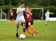 29 July 2018; Christian O’Reilly of Crumlin United in action against Logan Preston of St Kevin's, during Ireland's premier underaged soccer tournament, the Volkswagen Junior Masters. The competition sees U13 teams from around Ireland compete for the title and a €2,500 prize for their club, over the days of July 28th and 29th, at AUL Complex in Dublin. Photo by Seb Daly/Sportsfile