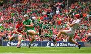 29 July 2018; Aaron Gillane of Limerick scores a point despite the attention of Anthony Nash of Cork during the GAA Hurling All-Ireland Senior Championship semi-final match between Cork and Limerick at Croke Park in Dublin. Photo by Ramsey Cardy/Sportsfile