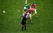 29 July 2018; Bill Cooper of Cork breaks his hurley against Cian Lynch of Limerick as referee Paud O'Dwyer throws in the sliothar to start the first period of extra time during the GAA Hurling All-Ireland Senior Championship semi-final match between Cork and Limerick at Croke Park in Dublin. Photo by Brendan Moran/Sportsfile