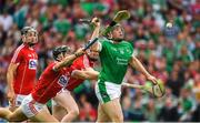 29 July 2018; Shane Dowling of Limerick attempts to strike the sliothar as he is fouled, in the square, by Mark Ellis of Cork while being supported by his team mate Damien Cahalane during the GAA Hurling All-Ireland Senior Championship semi-final match between Cork and Limerick at Croke Park in Dublin. Photo by Ray McManus/Sportsfile