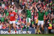 29 July 2018; Pat Ryan celebrates after scoring his side's third goal alongside his Limerick team-mate Peter Casey, right, as Tim O'Mahony of Cork watches on during the GAA Hurling All-Ireland Senior Championship semi-final match between Cork and Limerick at Croke Park in Dublin. Photo by Stephen McCarthy/Sportsfile
