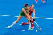 29 July 2018; Deirdre Duke of Ireland holds off the challenge of Giselle Ansley of England during the Women's Hockey World Cup Finals Group B match between England and Ireland at Lee Valley Hockey Centre, QE Olympic Park in London, England. Photo by Craig Mercer/Sportsfile