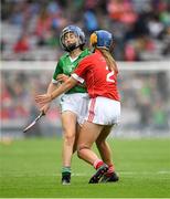 29 July 2018; Ciara Whelan-Barrett, Scoil Mhuire, Dungarvan, Co. Waterford, representing Limerick, in action against Holly Wall, Newtown Dunleckney, Carlow, representing Cork, during the INTO Cumann na mBunscol GAA Respect Exhibition Go Games at the GAA Hurling All-Ireland Senior Championship semi-final match between Cork and Limerick at Croke Park in Dublin. Photo by Ray McManus/Sportsfile