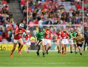 29 July 2018; Ciara Whelan-Barrett, Scoil Mhuire, Dungarvan, Co. Waterford, representing Limerick,  in action against Alison Donegan, Milford National School, Charleville, representing Cork, during the INTO Cumann na mBunscol GAA Respect Exhibition Go Games at the GAA Hurling All-Ireland Senior Championship semi-final match between Cork and Limerick at Croke Park in Dublin. Photo by Ray McManus/Sportsfile