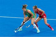 29 July 2018; Deirdre Duke of Ireland holds off the challenge of Giselle Ansley of England during the Women's Hockey World Cup Finals Group B match between England and Ireland at Lee Valley Hockey Centre, QE Olympic Park in London, England. Photo by Craig Mercer/Sportsfile