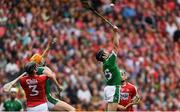 29 July 2018; Graeme Mulcahy of Limerick gathers possession ahead of team mate Séamus Flanagan and Damien Cahalane of Cork during the GAA Hurling All-Ireland Senior Championship semi-final match between Cork and Limerick at Croke Park in Dublin. Photo by Piaras Ó Mídheach/Sportsfile