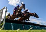 30 July 2018; Easy Game, left, with Ruby Walsh up, jumps the fifth, alongside Galtymore, with Denis Hogan up, on their way to winning the Galmont.com & Galwaybayhotel.com Novice Hurdle during the Galway Races Summer Festival 2018, in Ballybrit, Galway. Photo by Seb Daly/Sportsfile