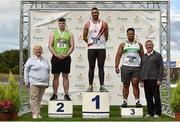 29 July 2018; Senior Men Discus medallists, from left, Eoin Sheridan of North Westmeath A.C., Co. Westmeath, silver, Marco Pons of D.M.P. A.C., Co.Wexford, gold, and Eric Favors of Raheny Shamrock A.C., Co. Dublin, bronze, alongside President of Athletics Ireland, Georgina Drumm, left, during the Irish Life Health National Senior T&F Championships Day 2 at Morton Stadium in Santry, Dublin. Photo by Sam Barnes/Sportsfile