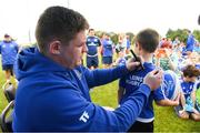 1 August 2018; Leinster player Tadhg Furlong signing autographs during the Bank of Ireland Leinster Rugby Summer Camp at Gorey RFC in Wexford. Photo by Eóin Noonan/Sportsfile