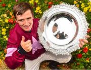 1 August 2018; Jockey Mark Enright celebrates with the trophy after winning the TheTote.com Galway Plate Handicap Steeplechase on Clarcam during the Galway Races Summer Festival 2018, in Ballybrit, Galway. Photo by Seb Daly/Sportsfile