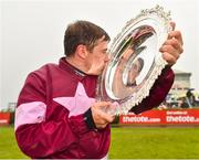 1 August 2018; Jockey Mark Enright celebrates with the trophy after winning the TheTote.com Galway Plate Handicap Steeplechase on Clarcam during the Galway Races Summer Festival 2018, in Ballybrit, Galway. Photo by Seb Daly/Sportsfile