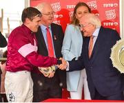 1 August 2018; Jockey Mark Enright is congratulated by President of Ireland Michael D Higgins after winning the TheTote.com Galway Plate Handicap Steeplechase on Clarcam during the Galway Races Summer Festival 2018, in Ballybrit, Galway. Photo by Seb Daly/Sportsfile