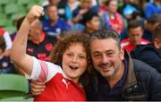 1 August 2018; Arsenal supporters 11 year old Leo, left, and Martin Reuland, from Belmullet, Co. Mayo, during the International Champions Cup match between Arsenal and Chelsea at the Aviva Stadium in Dublin. Photo by Ramsey Cardy/Sportsfile
