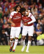 1 August 2018; Alex Iwobi of Arsenal, right, celebrates with Mohamed Elneny after scoring the winning penalty during the International Champions Cup match between Arsenal and Chelsea at the Aviva Stadium in Dublin. Photo by Sam Barnes/Sportsfile