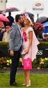 2 August 2018; Winner of the g Hotel Best Dressed Lady Charlene Byers, Mayobridge, Newry, Co Down, is congratulated by husband Paul during the Galway Races Summer Festival 2018, in Ballybrit, Galway. Photo by Seb Daly/Sportsfile