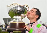 2 August 2018; Jockey Patrick Mullins with the trophy after winning the Guinness Galway Hurdle Handicap on Sharjah during the Galway Races Summer Festival 2018, in Ballybrit, Galway. Photo by Seb Daly/Sportsfile