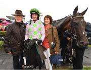 2 August 2018; The Mullins family, from left, trainer Willie Mullins, jockey Patrick Mullins, and mother Jackie Mullins after winning the Guinness Galway Hurdle Handicap with Sharjah during the Galway Races Summer Festival 2018, in Ballybrit, Galway. Photo by Seb Daly/Sportsfile
