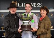 2 August 2018; Jockey Patrick Mullins celebrates with father and trainer Willie and mother Jackie after winning the Guinness Galway Hurdle Handicap on Sharjah during the Galway Races Summer Festival 2018, in Ballybrit, Galway. Photo by Seb Daly/Sportsfile