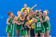 2 August 2018; Ireland players celebrate with goalkeeper Ayeisha McFerran after their victory in a penalty shootout during the Women's Hockey World Cup Finals Quarter-Final match between Ireland and India at the Lee Valley Hockey Centre in QE Olympic Park, London, England. Photo by Craig Mercer/Sportsfile