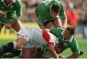 30 March 2003; Steve Thompson, England, is tackled by Ireland's Marcus Horan, right, and Malcolm O'Kelly. RBS Six Nations Rugby Championship, Ireland v England, Lansdowne Road, Dublin. Photo by Brendan Moran/Sportsfile