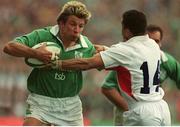 30 March 2003; Justin Bishop, Ireland, is tackled by Jason Robinson, England. RBS Six Nations Rugby Championship, Ireland v England, Lansdowne Road, Dublin. Photo by Brendan Moran/Sportsfile