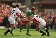 30 March 2003; Geordan Murphy, Ireland, is tackled by Martin Johnson,4, and Richard Hill,6, England. RBS Six Nations Rugby Championship, Ireland v England, Lansdowne Road, Dublin. Photo by Brendan Moran/Sportsfile
