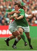 30 March 2003; Brian O'Driscoll, Ireland, is tackled by Richard Hill,  England. RBS Six Nations Rugby Championship, Ireland v England, Lansdowne Road, Dublin. Photo by Matt Browne/Sportsfile