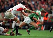 30 March 2003; Ronan O'Gara, Ireland, is tackled by Ben Kay,  England. RBS Six Nations Rugby Championship, Ireland v England, Lansdowne Road, Dublin. Photo by Matt Browne/Sportsfile