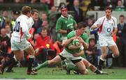30 March 2003; Ireland's Brian O'Driscoll is tackled by Richard Hill, England. RBS Six Nations Rugby Championship, Ireland v England, Lansdowne Road, Dublin. Photo by Brendan Moran/Sportsfile