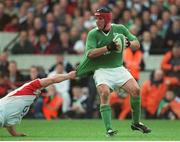 30 March 2003; Anthony Foley, Ireland, is tackled by England's Trevor Woodman. RBS Six Nations Rugby Championship, Ireland v England, Lansdowne Road, Dublin. Photo by Brendan Moran/Sportsfile