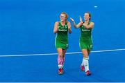 2 August 2018; Zoe Wilson and Megan Frazer of Ireland acknowledge the crowd on a victory lap after the Women's Hockey World Cup Finals Quarter-Final match between Ireland and India at the Lee Valley Hockey Centre in QE Olympic Park, London, England. Photo by Craig Mercer/Sportsfile