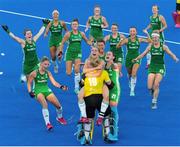 2 August 2018; Ireland players celebrate with goalkeeper Ayeisha McFerran after victory in a penalty shootout during the Women's Hockey World Cup Finals Quarter-Final match between Ireland and India at the Lee Valley Hockey Centre in QE Olympic Park, London, England. Photo by Craig Mercer/Sportsfile
