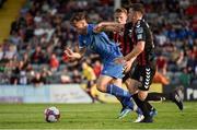 3 August 2018; Connor Ellis of Limerick in action against Keith Buckley, front, and Jonathan Lunney of Bohemians during the SSE Airtricity League Premier Division match between Bohemians and Limerick at Dalymount Park in Dublin. Photo by Piaras Ó Mídheach/Sportsfile