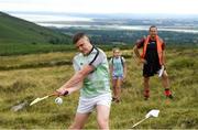 4 August 2018; Cillian Kiely of Offaly hits his last shot to win the senior men's competition during the 2018 M Donnelly GAA All-Ireland Poc Fada Finals in the Annaverna Mountain, Ravensdale, Co Louth. Photo by Piaras Ó Mídheach/Sportsfile