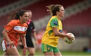 4 August 2018; Eiliish Ward of Donegal  in action against Megan Sheridan of Armagh during the TG4 All-Ireland Ladies Football Senior Championship quarter-final match between Armagh and Donegal at Healy Park in Omagh, Tyrone. Photo by Oliver McVeigh/Sportsfile