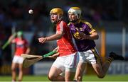 4 August 2018; Declan Dalton of Cork in action against Ian Carthy of Wexford during the Bord Gáis Energy GAA Hurling All-Ireland U21 Championship Semi-Final match between Cork and Wexford at Nowlan Park in Kilkenny. Photo by Matt Browne/Sportsfile