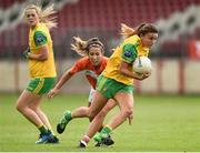 4 August 2018; Niamh Hegarty of Donegal  in action against Sharon Reel of Armagh during the TG4 All-Ireland Ladies Football Senior Championship quarter-final match between Armagh and Donegal at Healy Park in Omagh, Tyrone. Photo by Oliver McVeigh/Sportsfile