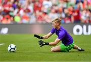 4 August 2018; Caoimhin Kelleher of Liverpool warms up prior to the Pre Season Friendly match between Liverpool and Napoli at the Aviva Stadium in Dublin. Photo by Seb Daly/Sportsfile